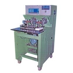 Coil Tapping Machine